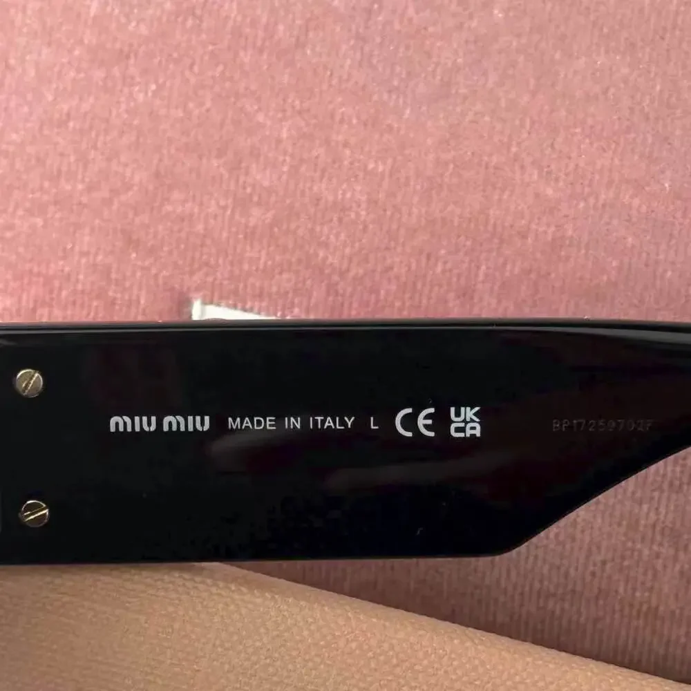 Miu Miu Glossy Black Cat Eye Acetate Sunglasses